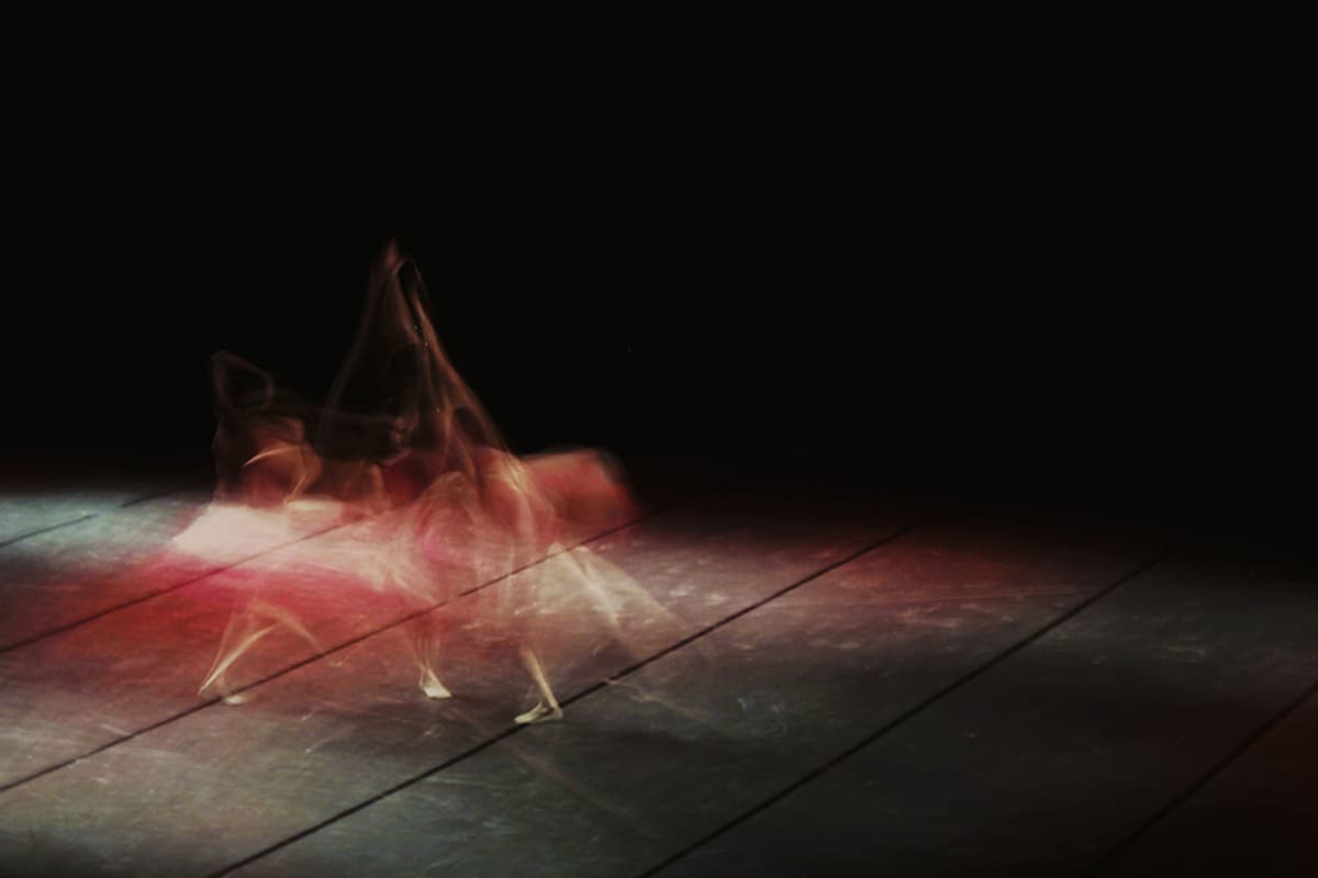 event photography, dancers on stage, vibrant colors, dynamic