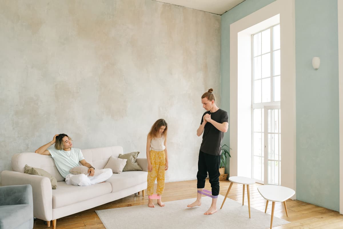 family group posing, living room, natural light, candid